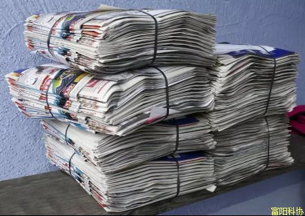 “法轮功”街头小报暴富的背后是欺诈洗钱